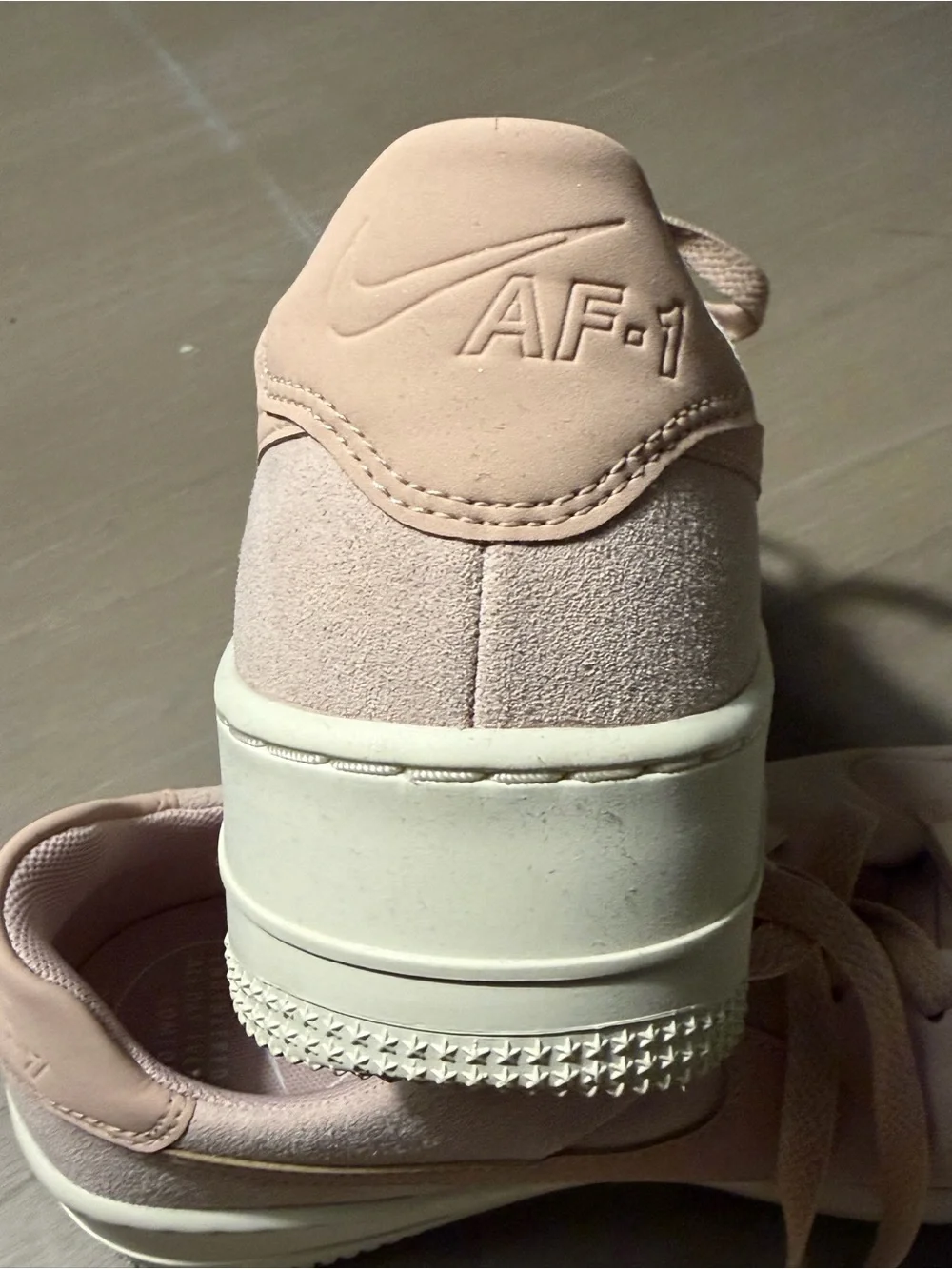 Nike Women’s Light Pink Suede Platform Sneakers